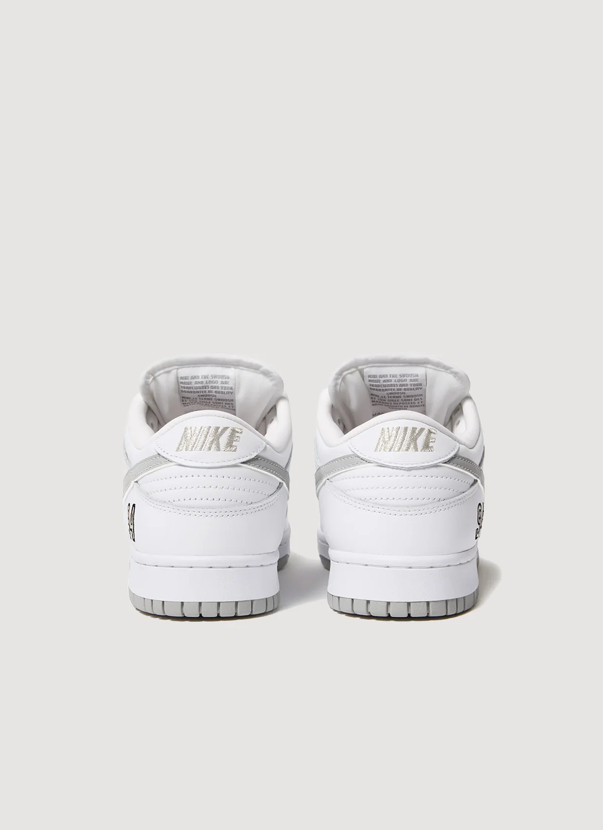 Nike Supreme SB 94 Dunk Low White Metallic Silver - Image 2